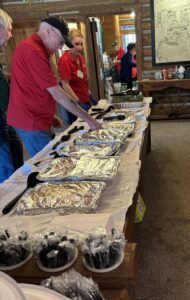 buffet line of food on table for veterans